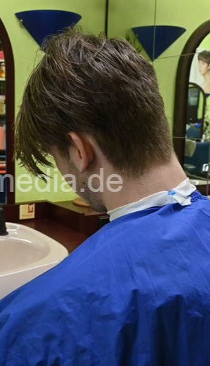 2301 Lars 1 caping and asian shampooing by salonbarber - vertical video