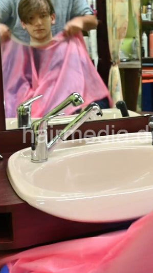 2301 Lars 1 caping and asian shampooing by salonbarber - vertical video
