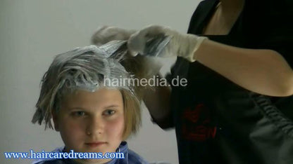 1902 young girl dramatical haircut and bleaching