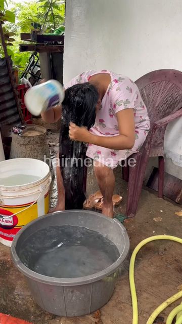 1242 250820 village hair washing of teen forward with help
