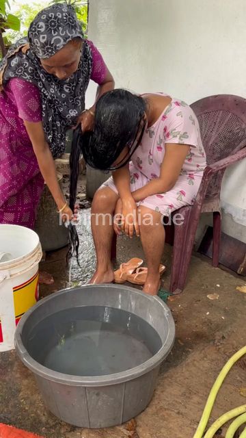 1242 250820 village hair washing of teen forward with help