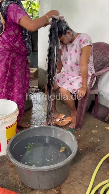 1242 250820 village hair washing of teen forward with help