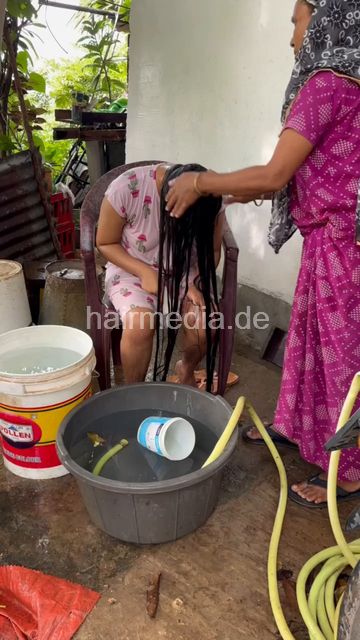 1242 250820 village hair washing of teen forward with help