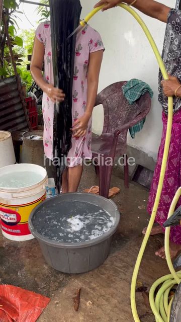 1242 250820 village hair washing of teen forward with help