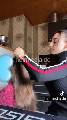 1231 barberette Pricilla doing a braid on girlfriend