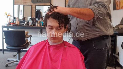 Artur firm scalp massage using lots of Alpecin tonic and blow dry twister style by barber, girlfriend is watching