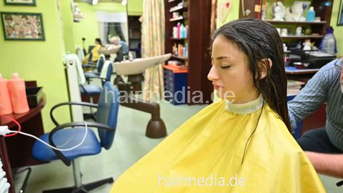 Barberette Leyla dry haircut by barber and backward shampooing