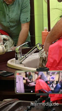 Cargar imagen en el visor de la galería, 2303 VanessaH 2 chewing forward shampooings by barber in red cape - vertical video