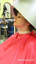 将图片加载到图库查看器，2303 VanessaH 3 chewing metal rollers wetset and hood dryer by barber in red cape - vertical video