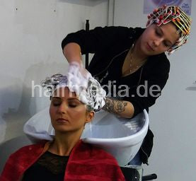 134 Jessy (client) by Jessy (barberette) in perm rollers backward shampoo