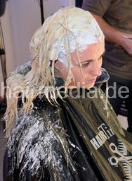 Teen Ardita going blonde - by barber