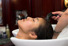 Load image into Gallery viewer, 749 Eunji shampooing korean hair backward in Berlin vintage salon