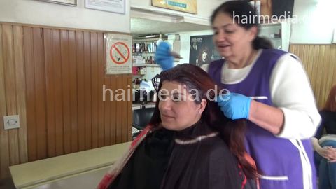 DanijelaD - new model, her very thick hair is colored in violet, then she is shampooed by old lady barber Ruzica. She has a haircut and foenen as well.