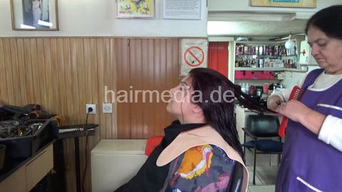 DanijelaD - new model, her very thick hair is colored in violet, then she is shampooed by old lady barber Ruzica. She has a haircut and foenen as well.