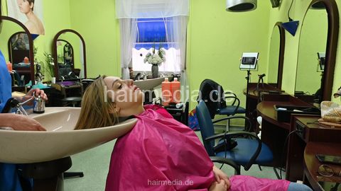 Deborah by Leyla 1 backward shampooing client in apron