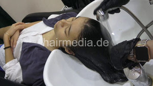 359 Evhana shampoo backward, haircare and blow out in black large cape