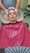 Cargar imagen en el visor de la galería, 2303 KatharinaM 1 by salonbarber shampooing in red cape and multicaping thickhair  - vertical video