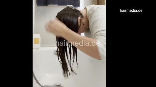 1076 JackieS 1 self shampooing at home over bath tub and blow