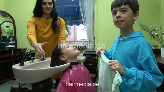 2308 Daughter Lia 2 young girl backward wash in standing position and blow out