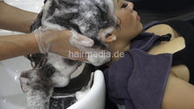 Laden Sie das Bild in den Galerie-Viewer, 359 Mandy in barberchair shampoo backward, haircare and blow out in towel only