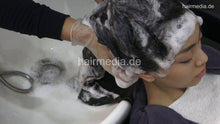 Cargar imagen en el visor de la galería, 359 Meg in barberchair several shampooing backward, haircare and blow out