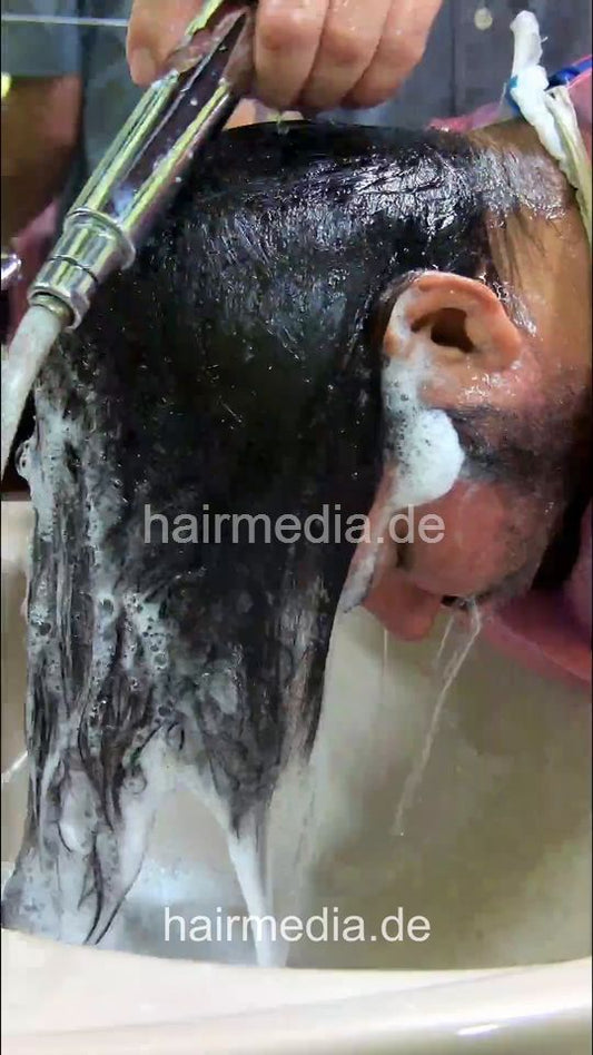 2304 Nasir 1 shampoo forward manner long hair - vertical video