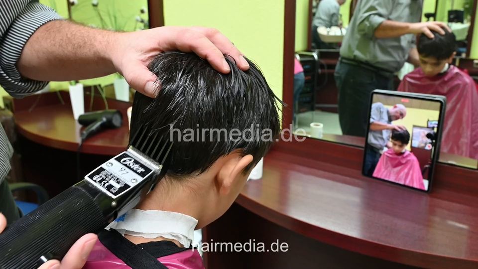 2308 Niklas 2 young boy buzz and cut by barber, mom controlled