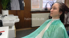 Laden Sie das Bild in den Galerie-Viewer, 1238 Tetjana 4 wet haircut long and thick hair in green cape by barber and forward blow dry