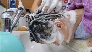 8402 Vera 2 forward shampoo hair ear and face in barbershop by female barber JelenaB