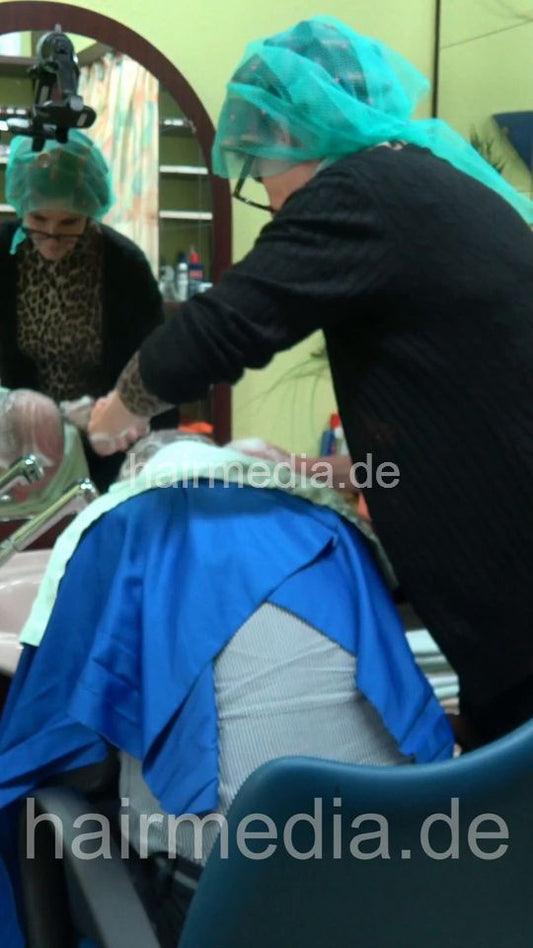 1259 Barberette CarmenC in rollers and hairnet doing male client