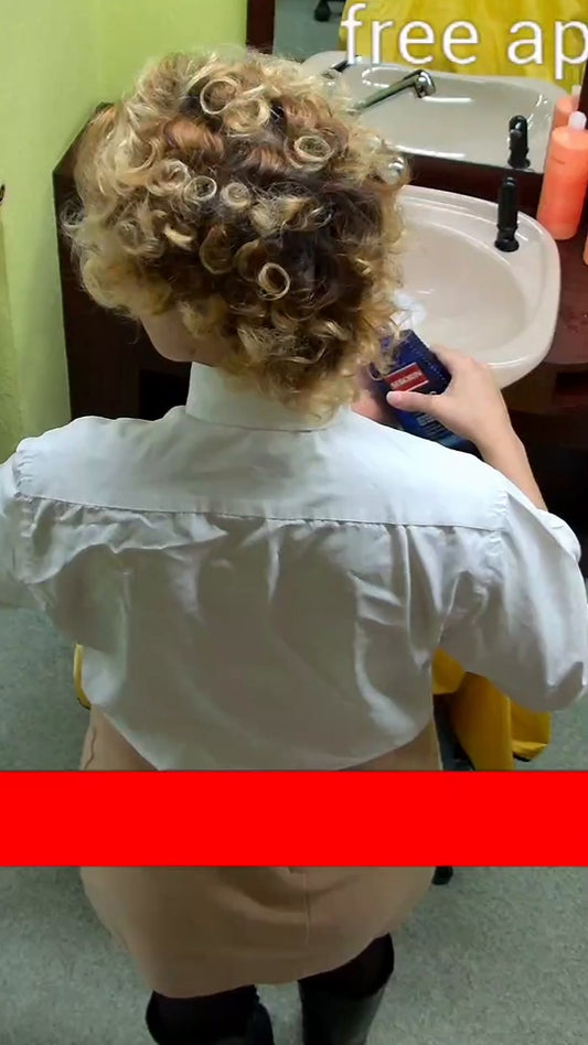 1251 Barberette Nora doing male client forward shampoo, scalp massage vertical cam