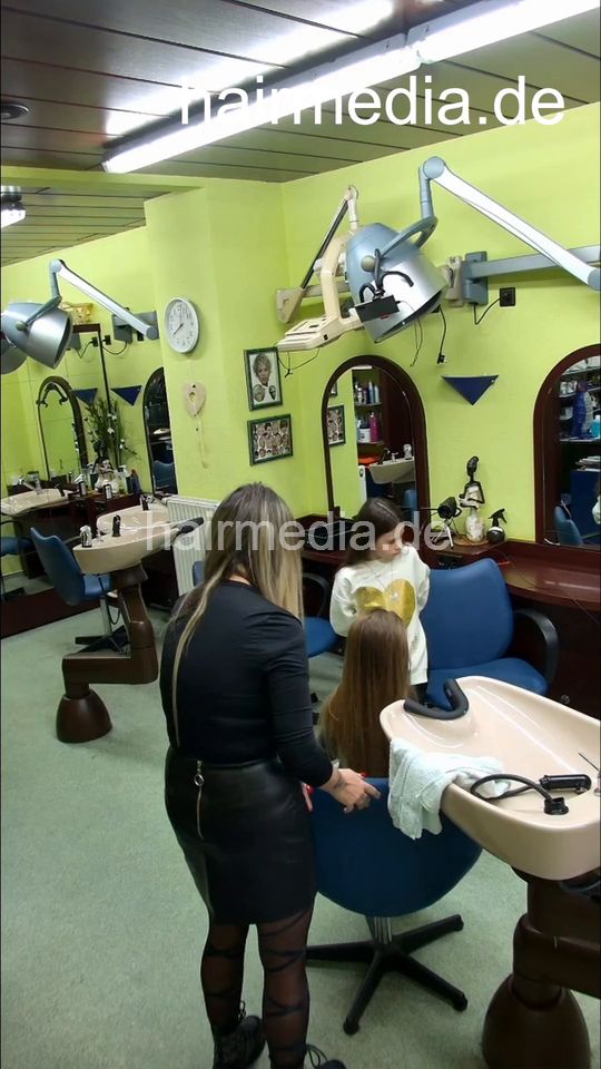 544 Barberette Paulina younger daughter 2nd run hair kneeling fresh styled forward wash and blow - vertical cam