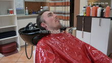 Cargar imagen en el visor de la galería, 2017 Niclas chewing 1 backward shampoo 3x by barber in red vinyl cape hairwash MTM