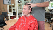 Cargar imagen en el visor de la galería, 2017 Niclas chewing 3 scalp tonic massage and blow by barber in red vinyl cape MTM