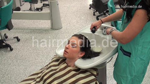 350 Oxana by Jacqueline backward salon shampooing in green nylon apron