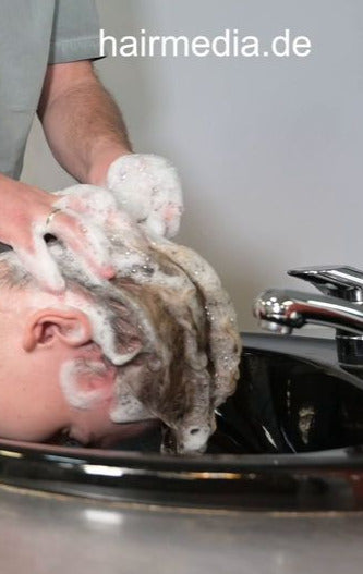 1188 07 Max youngboy by old barber forward shampooing vertical video