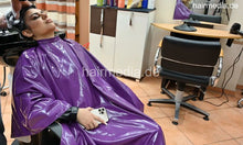 Laden Sie das Bild in den Galerie-Viewer, 1226 09 NatashaA backward shampoo in purple shampoocape by barber
