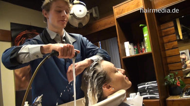 1008 Anna backward salon hairwash by young smart barber Nick shampooing