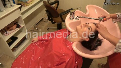 1141 SarahS by OlgaB washing hair backward in double bowl in heavy vinyl cape