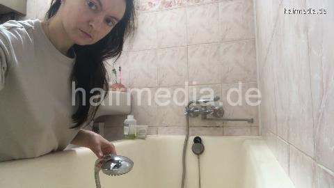1153 Natasha Ukraine self home hair shampooing over bathtub