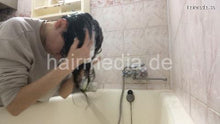 Load image into Gallery viewer, 1153 Natasha Ukraine self home hair shampooing over bathtub