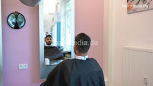 Load image into Gallery viewer, 1209 Zoya serving male customer cousin 2 haircut in salon red skirt