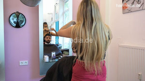 1209 Zoya serving male customer cousin 2 haircut in salon red skirt