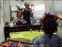 Laden Sie das Bild in den Galerie-Viewer, 154 2 Fr. Pablowsky setting AnjaS wearing pink apron small afro curls