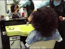 Laden Sie das Bild in den Galerie-Viewer, 154 2 Fr. Pablowsky setting AnjaS wearing pink apron small afro curls