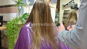 1222 YasminN 1 dry cut long blonde thick teen hair by barber in pvc cape