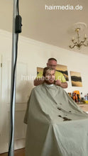 Load image into Gallery viewer, 2012 230227 buzzcut and coloring tint at home in black vinyl cape