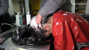 1176 AlinaR 1 forward shampoo hairwash by barber in red PVC cape