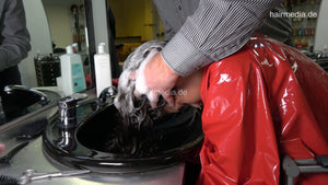 1176 AlinaR 1 forward shampoo hairwash by barber in red PVC cape