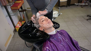 1176 Geraldine 1 backward salon black bowl shampoo in knitwear and pvc shampoocape